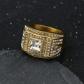 Macro detail of men's gold stainless steel ring with square cut crystal and micro pave - US 7 / Gold + White Stone