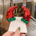 Detail of red sequined reindeer horn hair clips with green pom poms and metal duckbill clips - 1 Pair Red Horns