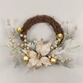 Christmas pine needle wreath with large gold flower and ornaments on brown rattan - Without Lights