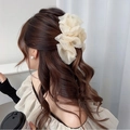 Elegant beige lace scrunchie with faux pearls and reflective accents on a ponytail - Seersucker Claw Clip / Beige