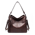 Detail of vintage brown PU leather shoulder bag with zipper pockets and tassel - Single Bag / Coffee