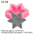Pink 3D snowflake silicone mold with gray cake topper and size specifications - Pink