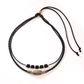Collana vintage con perla Dzi in corda intrecciata nera e dettagli in metallo - Collana
