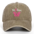 Detail of embroidered Believe text with pink ribbon and butterfly on washed khaki cap - Adjustable / Khaki