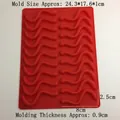 Detailed top view of 20-cavity red silicone snake mold with precise size measurements - Red