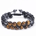 Close-up of dual-layer blue tiger eye and black agate beaded bracelet with adjustable cord - Yellow Tiger Eye + Black Beads + Black Magnetite