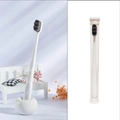 White minimalist wide head toothbrush with gray soft bristles and ceramic base - Bamboo Charcoal Wave Tube / White