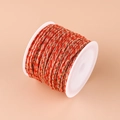 Red and gold braided cotton cord on a white plastic spool for DIY jewelry making - No.19 Grey Red