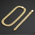 Close-up of gold iced-out Cuban link chain and bracelet set with pavé rhinestones - 8inch Bracelet + 24inch Necklace / Gold