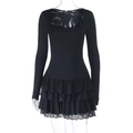 Detail of multi-layered lace and ruffle hem on a black long-sleeve mini dress - S / Black