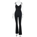 Detailed view of the black sleeveless jumpsuit with lace trim V-neck and flared leg design - XS / Black