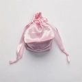 Elegant pink satin drawstring storage pouch with matching silk ribbon knots for accessories - Pink