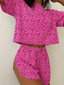 Detailed view of pink leopard print crop top and high slit drawstring shorts set - Rose Red Leopard