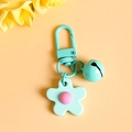 Mint green flower keychain with pink center and matching bell on a metal lobster clasp - Lake Green