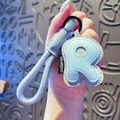 Letter R light blue leather keychain with lychee texture and braided wrist strap - Letter R