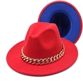 Detail of red and blue fedora hat featuring bold gold acrylic chain link decoration - Red+Royal Blue