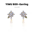 Detailed view of floral drop earrings with purple petals and a gold leaf pendant - Purple Petal Water Drop Bead Pendant Style (6#)