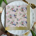 Pink floral printed square napkin with golden scalloped edges on a white serving plate - Pink Floral Gold Scalloped (1085)