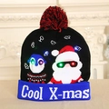 Christmas LED knit hat in black and blue featuring penguin design with glowing lights - Penguin and Snowman