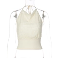 Nahaufnahme von cremefarbenem Halter-Top mit Spitze und schmalem Taillendesign - S / Aprikose
