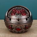 Vintage bronze spherical ashtray with red rose relief and leaf patterns on wood - Red Copper Heart Red Flower