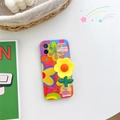 Detail of colorful floral phone case with a 3D yellow flower grip on a silicone cover - SJ1 Rainbow Flower Wristband / iPhone 15