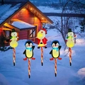 Solar powered Christmas garden stakes featuring Santa and Snowman for outdoor lawn decor - New Red Tube Set (Santa/Snowman/Penguin)