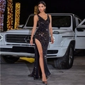 Detail of black sequined evening gown featuring a deep V-neck and high side leg slit - S / Black Multi-color Sequin