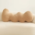 Camel wavy wave-shaped throw pillow in soft sherpa fabric on a cream curved sofa - 96*50cm/1.3kg / Milk Tea Wave Pillow