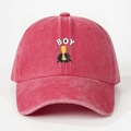Detail of washed cotton baseball cap featuring embroidered BOY text and trophy graphic - One Size / Watermelon red