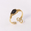 Handmade wire wrapped gold ring featuring a polished oval black stone in adjustable style - Black (Obsidian)