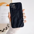 Close-up of black matte wrinkled texture silicone protective case for iPhone 15 Pro Max - Black / iPhone 15