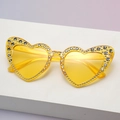 Sparkling yellow heart sunglasses with rhinestones and UV400 lenses on a pedestal - Rhinestone Yellow Frame Yellow Lens
