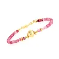 Close-up of faceted rose chalcedony beads with a textured gold bead and adjustable chain - Strawberry Quartz Round Bead