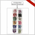 Detailed top view of 12 colors plum blossom nail art rhinestones in a clear storage case - 12 Colors Plum Flower Rhinestones