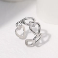 Minimalist silver stainless steel open ring featuring a hollow heart-shaped pattern - Silver Heart Cutout Style (JR027)