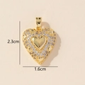 Detailed view of gold zircon heart pendant measuring 2.3 cm height and 1.6 cm width - 0228-5/Gold Micro-set Heart