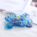 Blue elastic hair ties in a clear daisy-patterned pouch with a zipper closure - 50Pcs/Bag / Blue Series