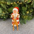 Père Noël électrique chevauchant un renne en peluche déco pour cadeaux de Noël - Père Noël sur renne 22CM