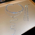 Macro shot of luxurious multi-layer rhinestone choker necklace and long tassel earrings - Necklace and Earring Set / Silver
