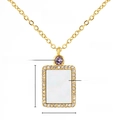 February gold birthstone necklace with purple amethyst and white shell inlay - February