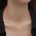Detail of a gold plated Y-shape necklace with fresh water pearls and sparkling rhinestones - Gold Thin Chain-Alternative Pearl and Rhinestone