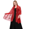 Detailed view of red sequined embroidered lace shawl on an elegant evening dress - Red