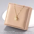Rotating gold titanium necklace with zircon flower pendant on a 45cm chain - Hollow Flower Style (A1393)