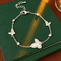 Detail of silver butterfly bracelet with zircon and mother of pearl on a jewelry box - Three Butterflies Mother-of-Pearl Style / Silver