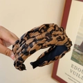 Geflochtenes Haarband mit Leopardenmuster in Braun und Schwarz für hohes Kopfvolumen - Geflochtener Twist / Dunkelkaffee Leopard