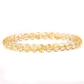 Translucent 6mm natural stone bead bracelet with golden engraved mantra symbols - White Mantra Stone