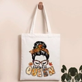 Detailed close-up of Pumpkin QUEEN graphic print on a cream canvas tote bag - Pumpkin QUEEN Leopard Frame