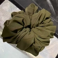 Detailed view of an olive green oversized chiffon scrunchie with soft pleated texture - Olive Green (2-1)