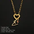 14K gold plated stainless steel heart clasp necklace with initial and pink gemstone - Letter V